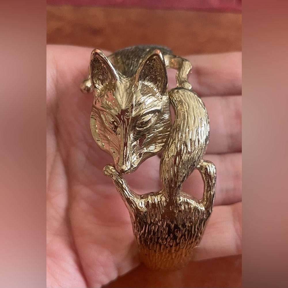 Adorable brass colored costume bangle of a fox